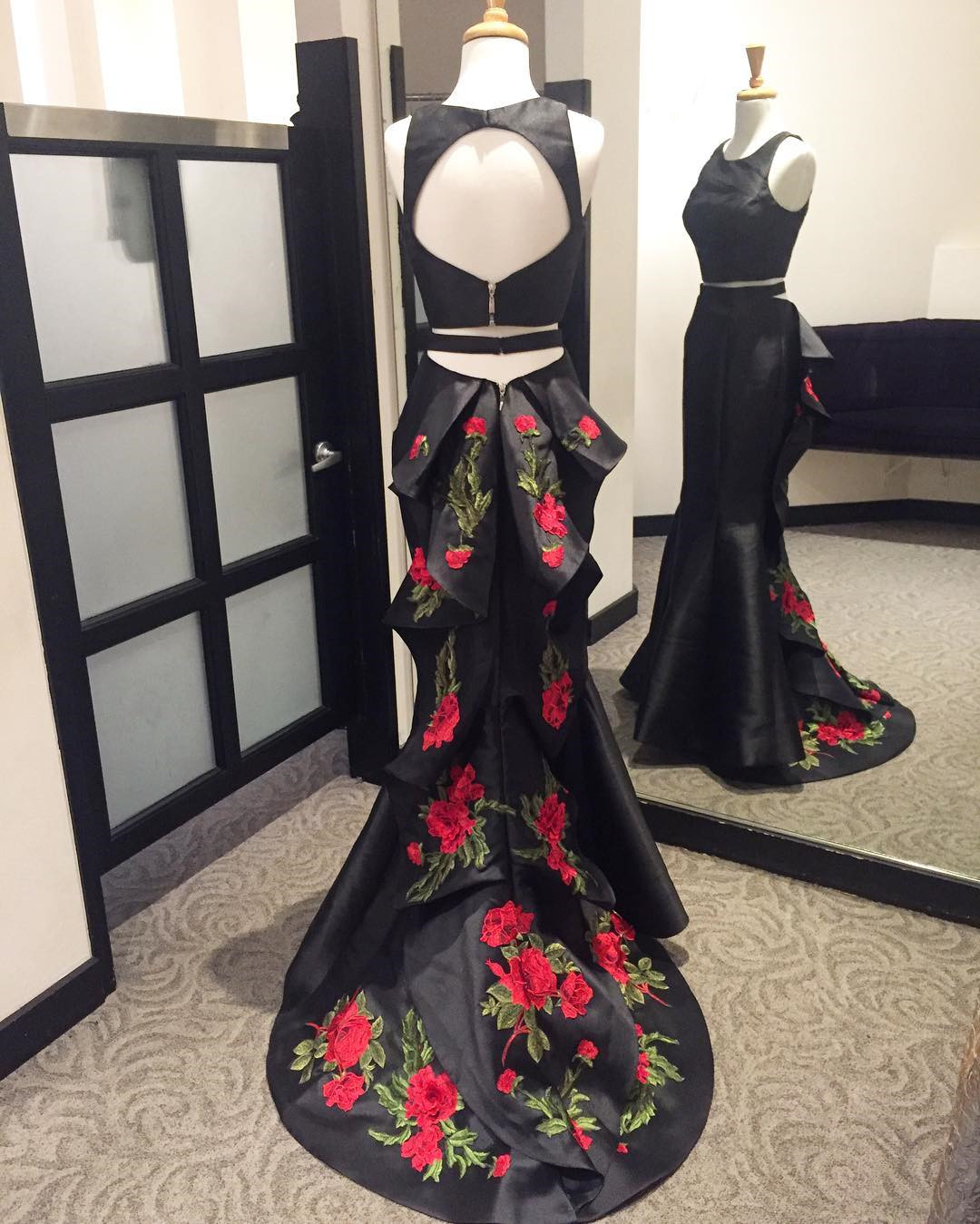 black dress with red roses prom